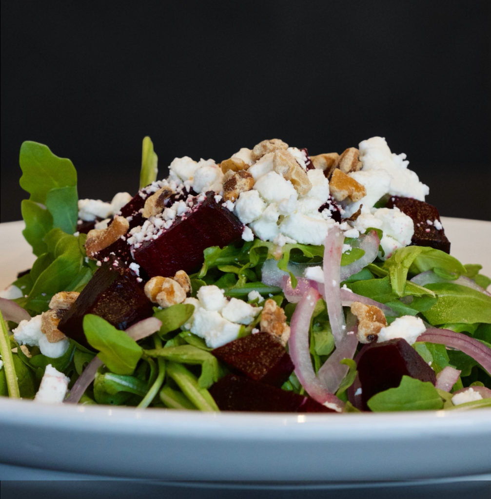 Via Cibo salad with greens, beets, goat cheese and walnuts